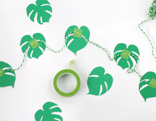 monstera plant garland and cupcake toppers
